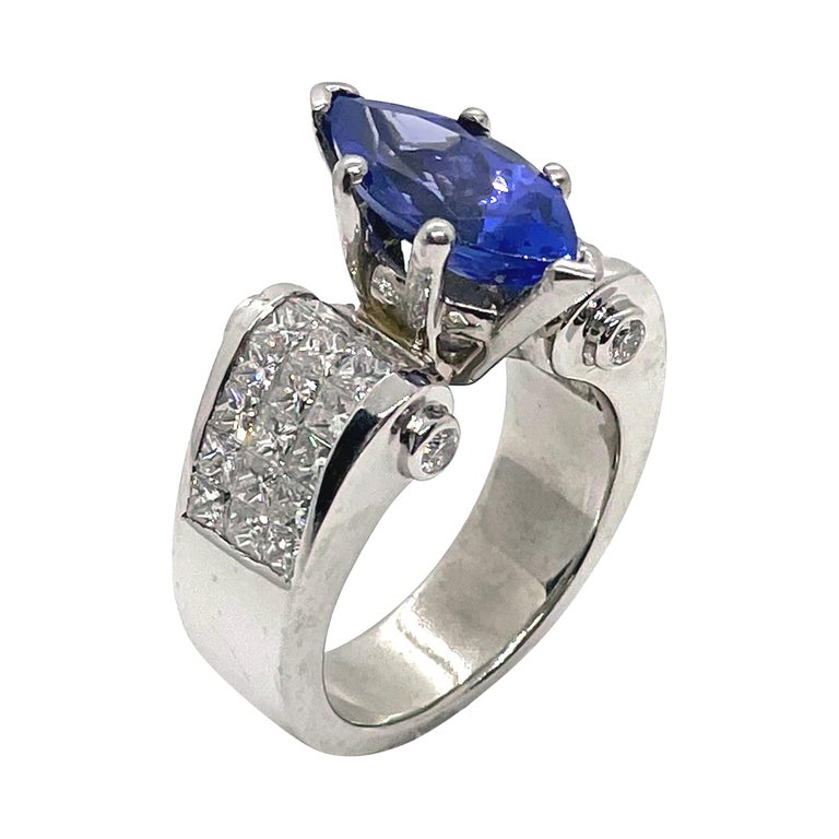 Marquie Tanzanite and Invisibly Set Diamonds in Platinum Ring