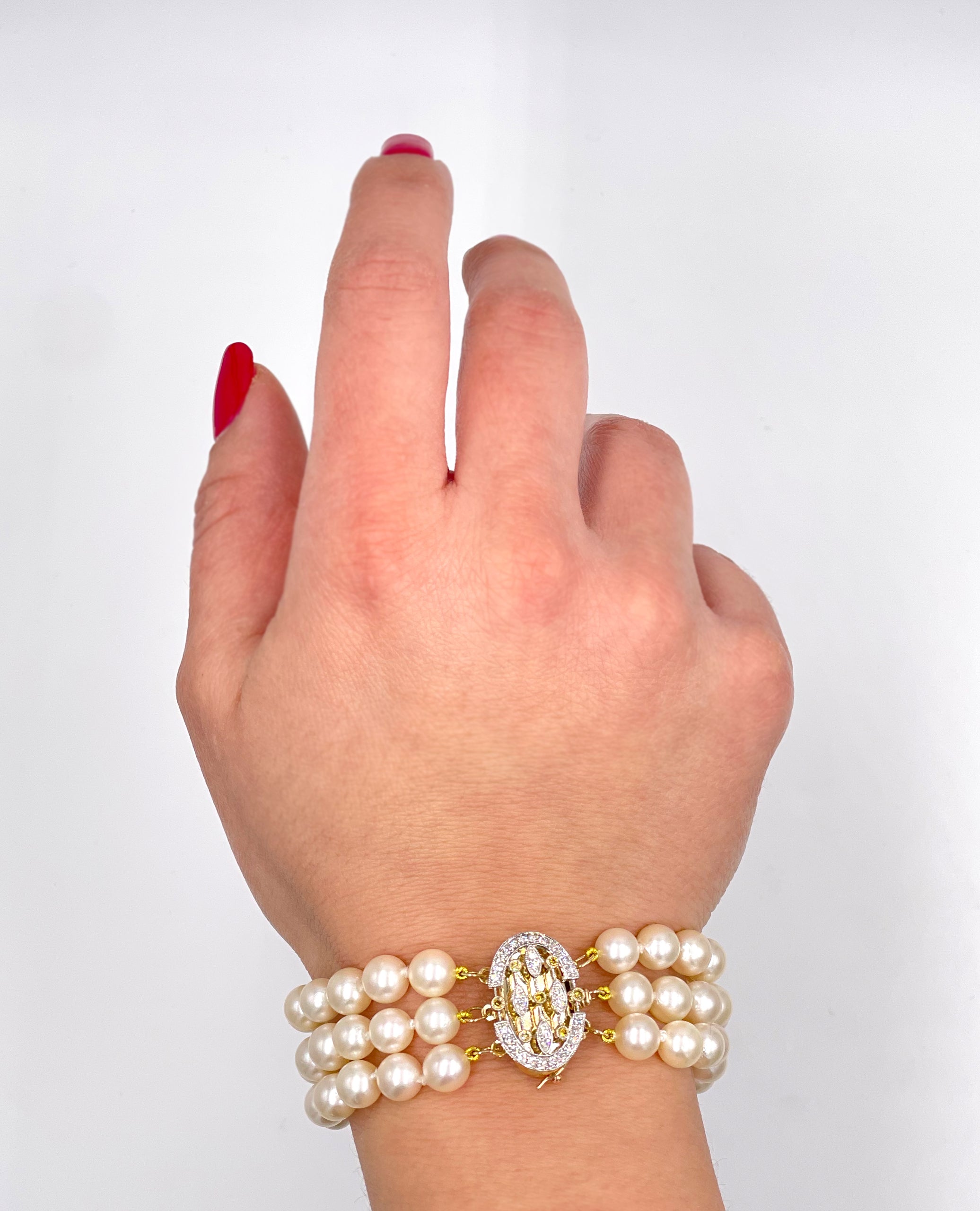 Three Row Multi Strand Pearl Bracelet with 14K & 18K Diamond Clasp