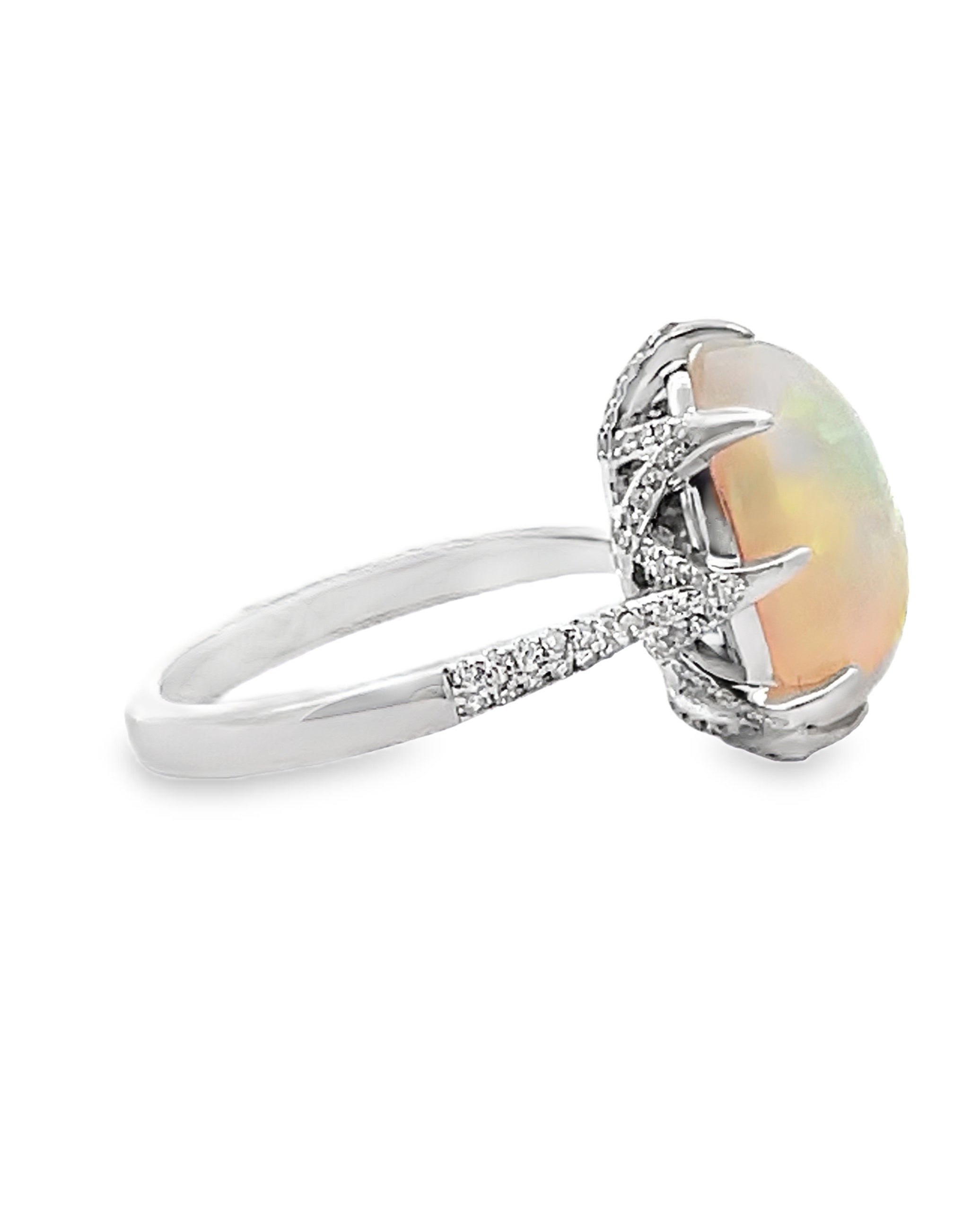 Oval Shaped Opal Ring Prong Set in 14K White Gold