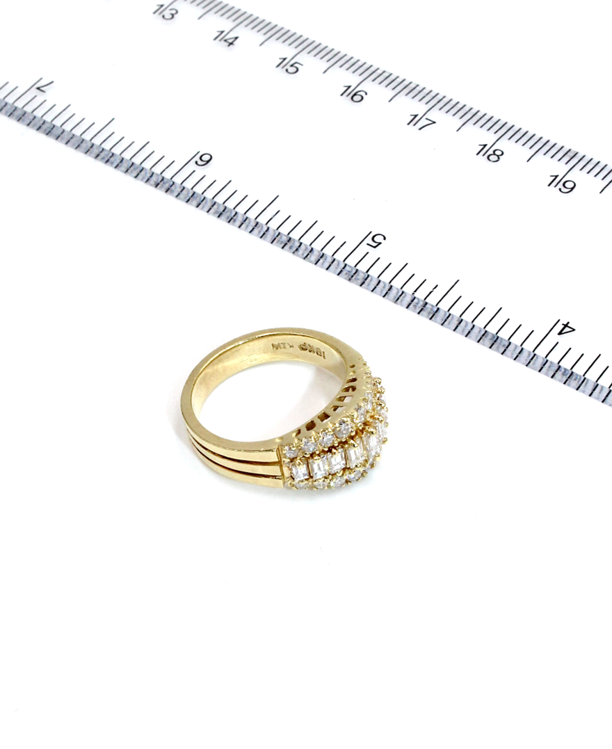 Vintage Tapered Diamond Band Ring with Baguette and Round Diamonds Totaling 1.30 Carats