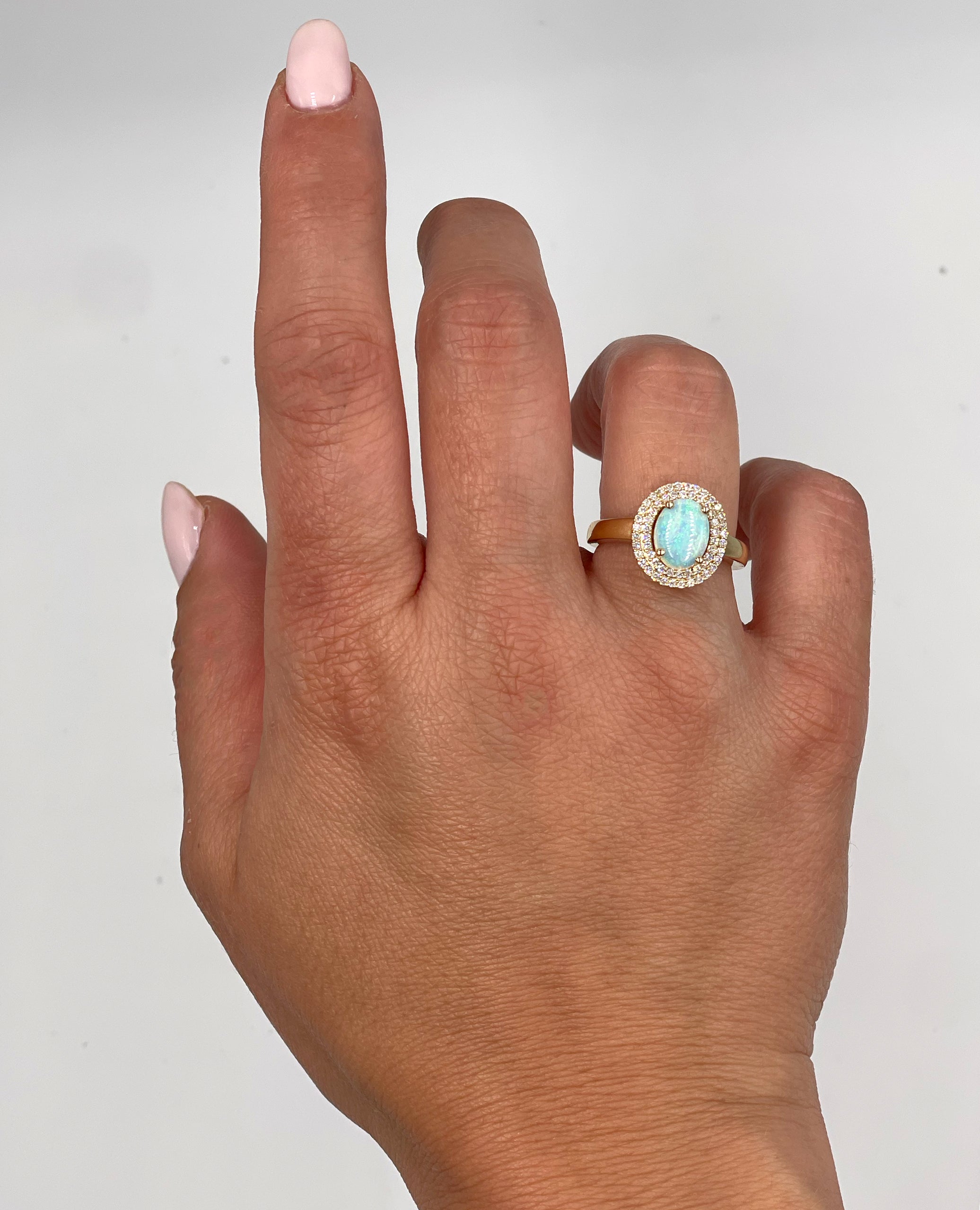 Oval Opal Ring in 14K Yellow Gold with Double Halo Diamond