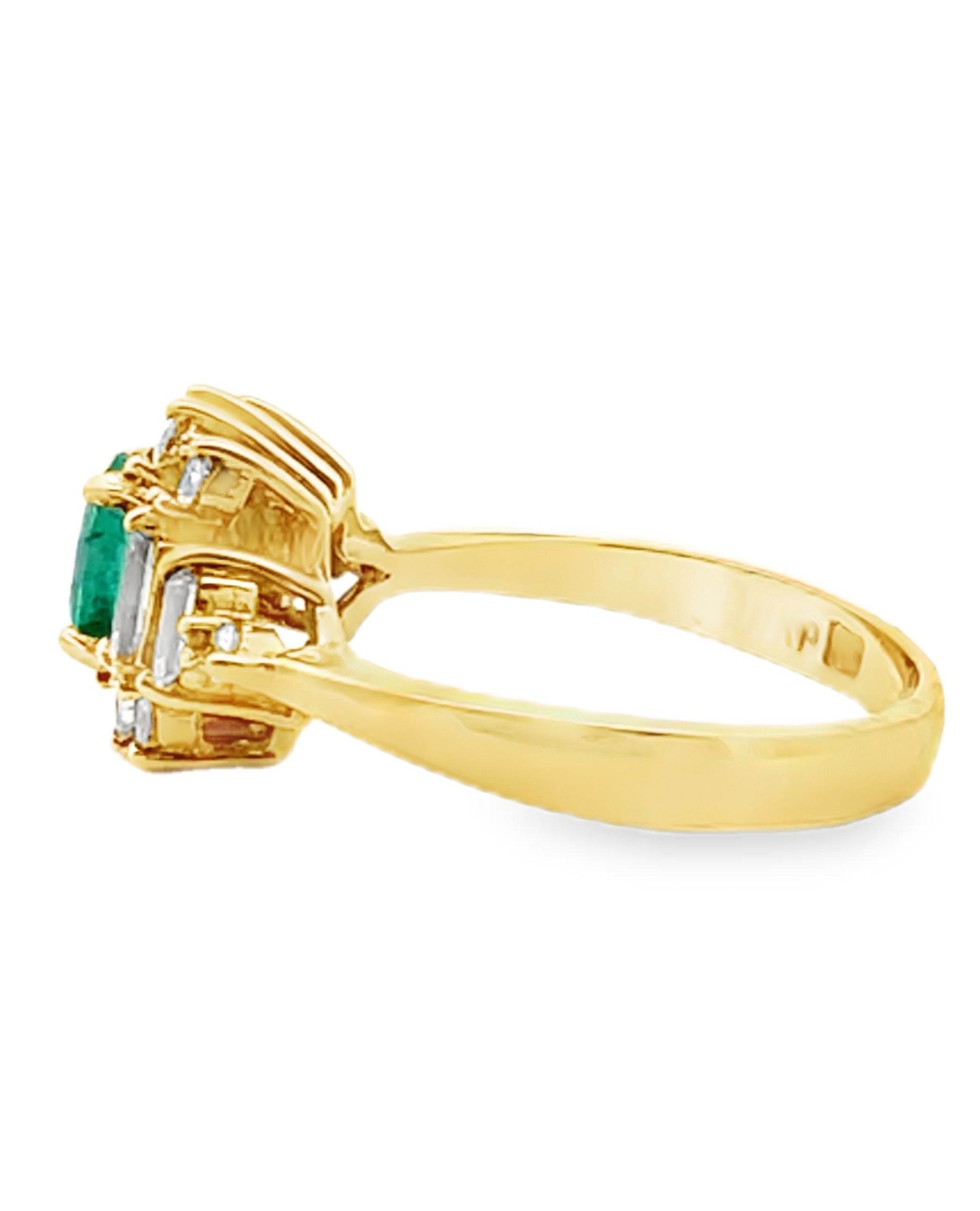 Vintage Oval Emerald Ring with Round and Baguette Diamonds Set in 18K Yellow Gold