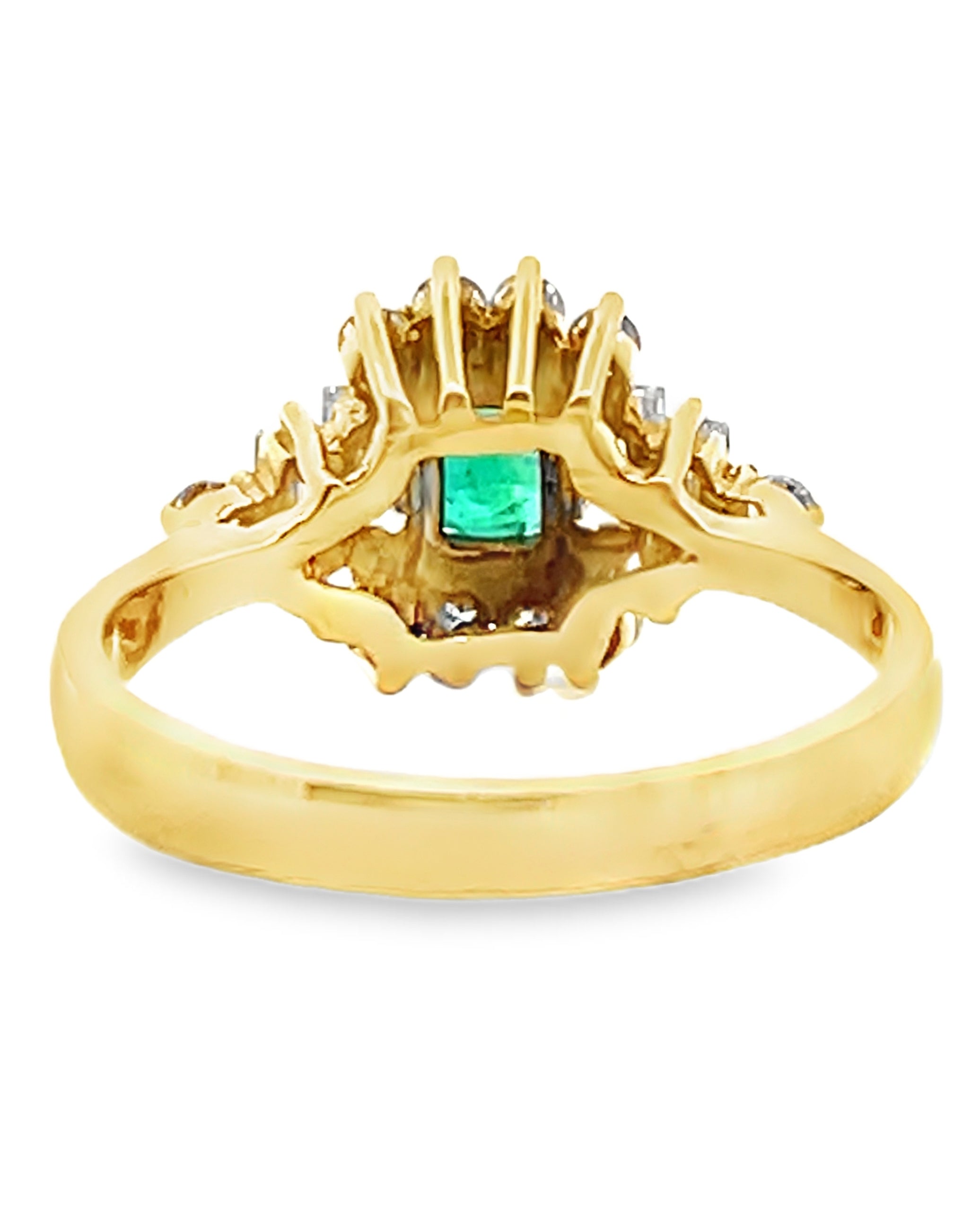 Vintage Oval Emerald Ring with Round and Baguette Diamonds Set in 18K Yellow Gold