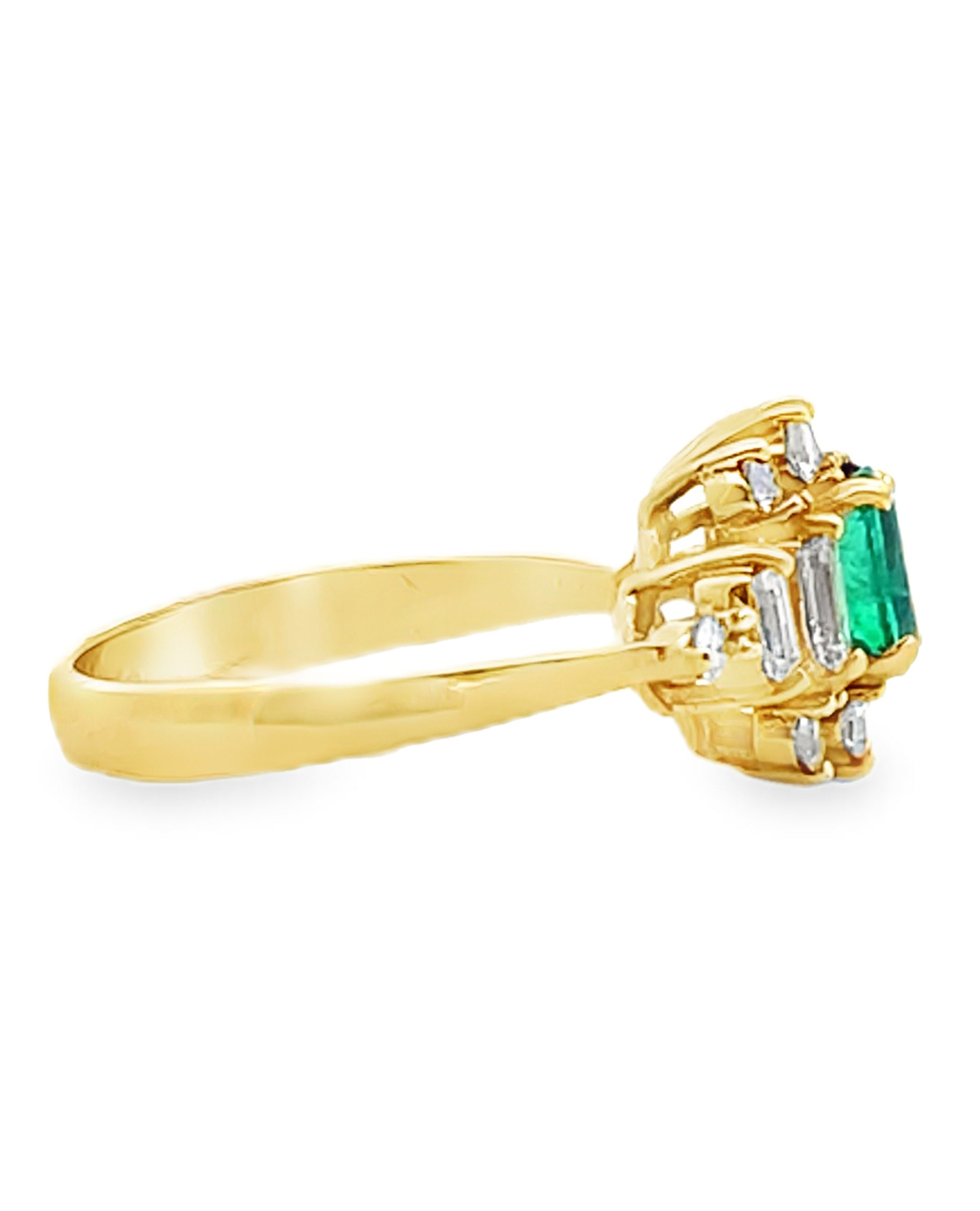Vintage Oval Emerald Ring with Round and Baguette Diamonds Set in 18K Yellow Gold