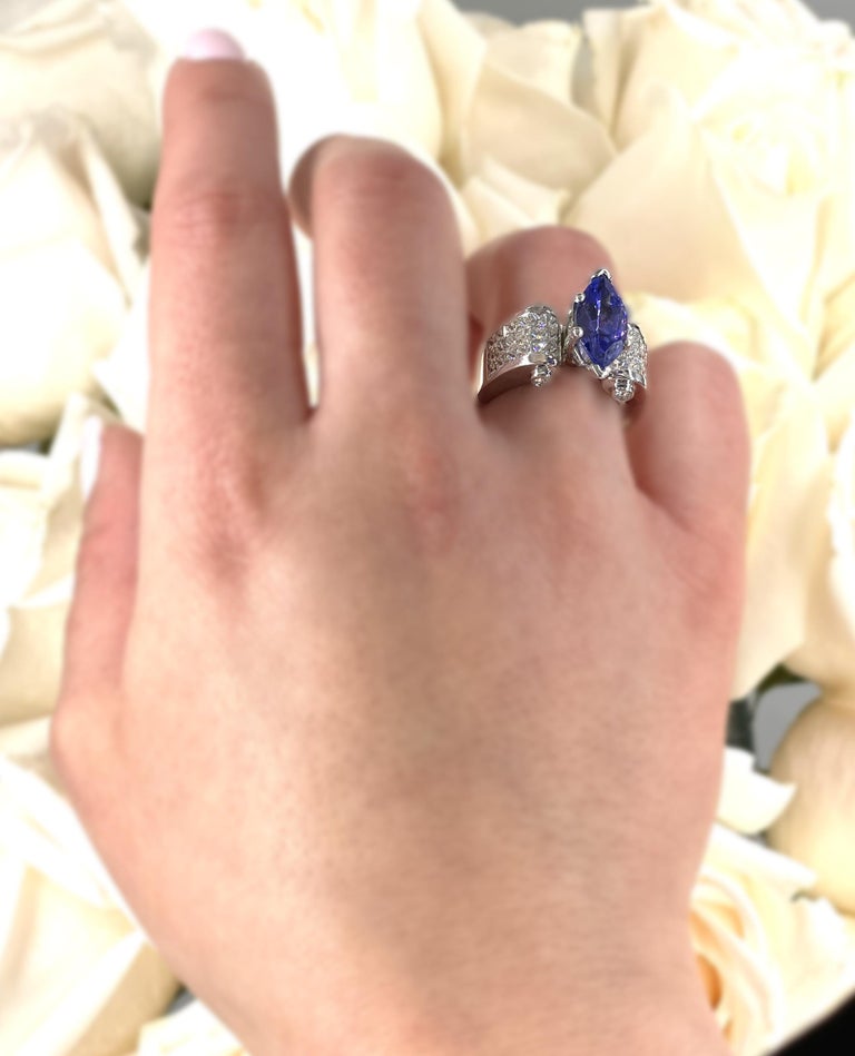 Marquie Tanzanite and Invisibly Set Diamonds in Platinum Ring