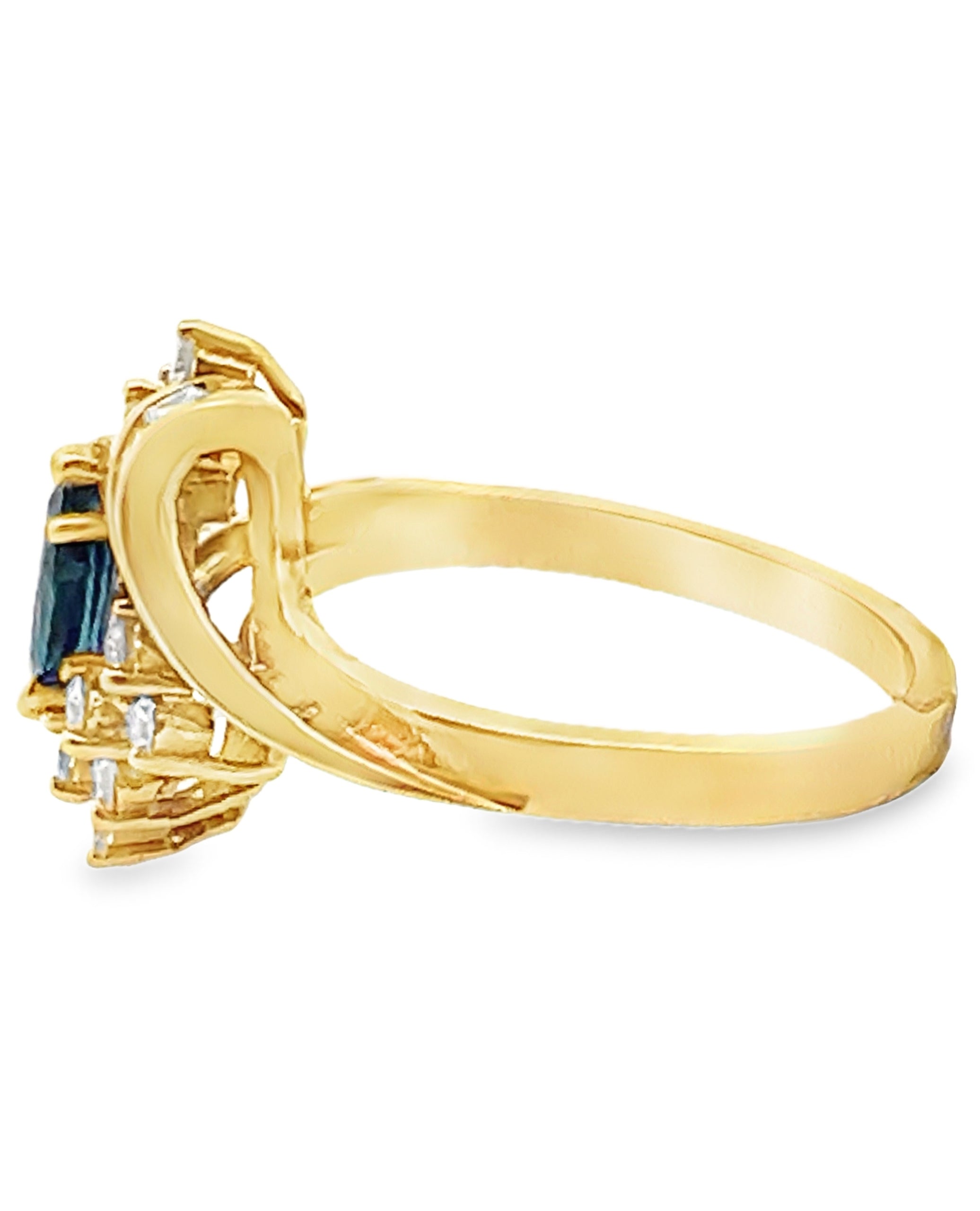 Vintage 0.80 Carat Marquise Sapphire Ring with Bageutte and Round Diamonds 1.10 Carats in 18K Yellow Gold