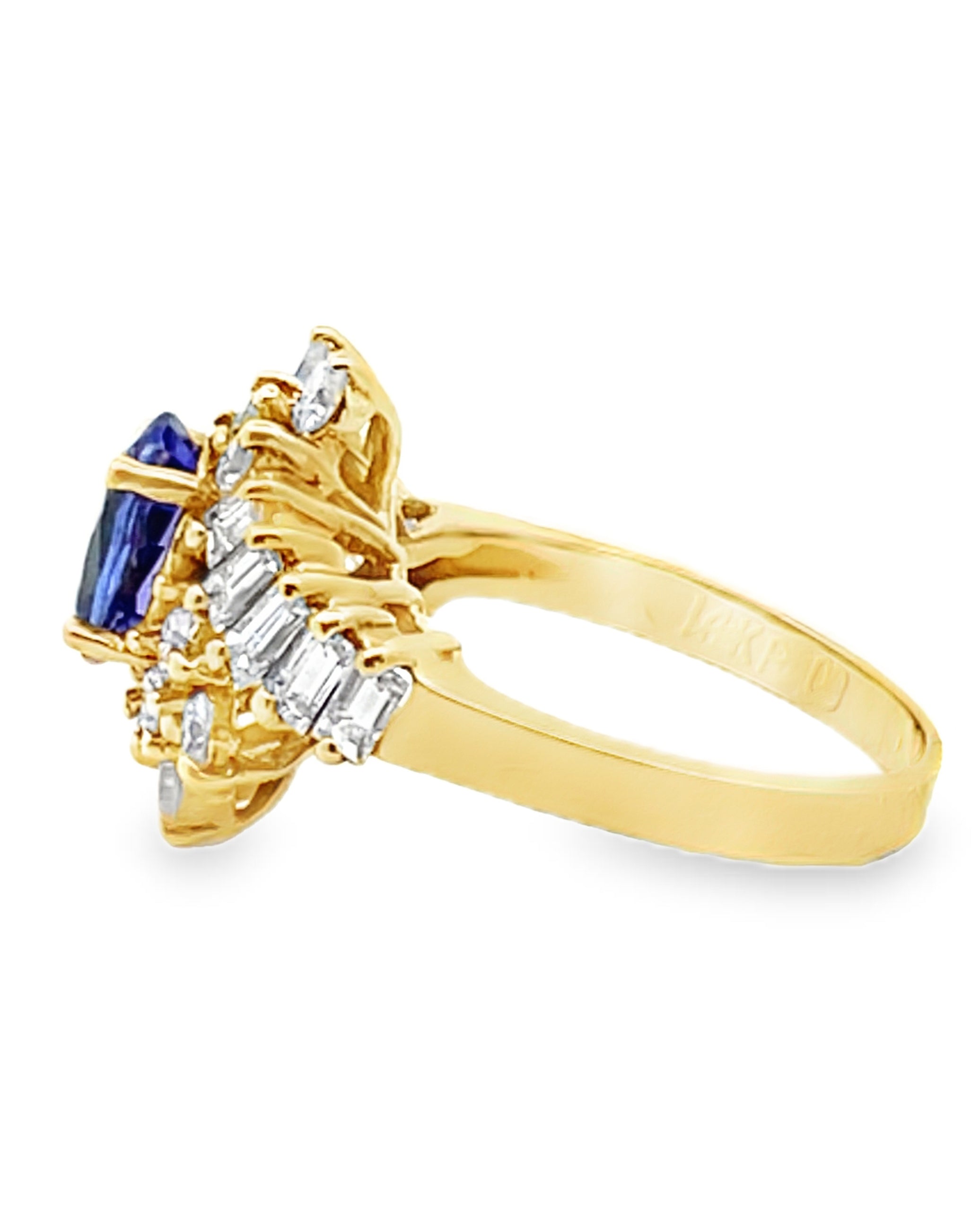 Vintage Oval Tanzanite Ring with Round and Baguette Diamonds Set in 14k Gold