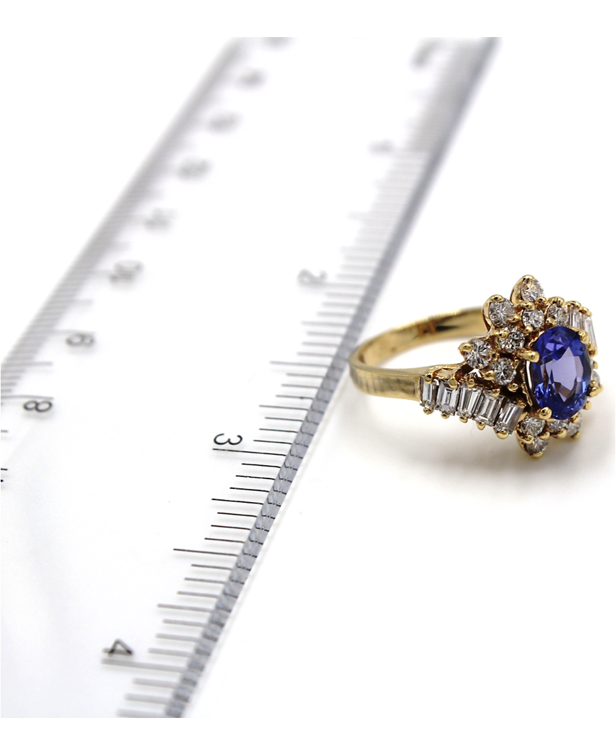 Vintage Oval Tanzanite Ring with Round and Baguette Diamonds Set in 14k Gold
