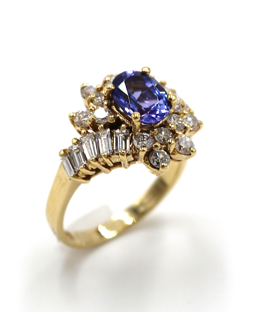 Vintage Oval Tanzanite Ring with Round and Baguette Diamonds Set in 14k Gold