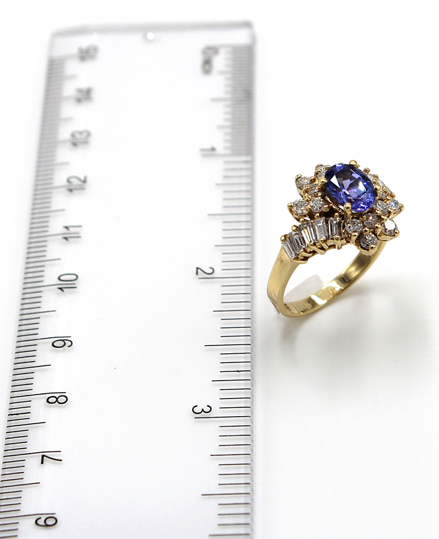 Vintage Oval Tanzanite Ring with Round and Baguette Diamonds Set in 14k Gold