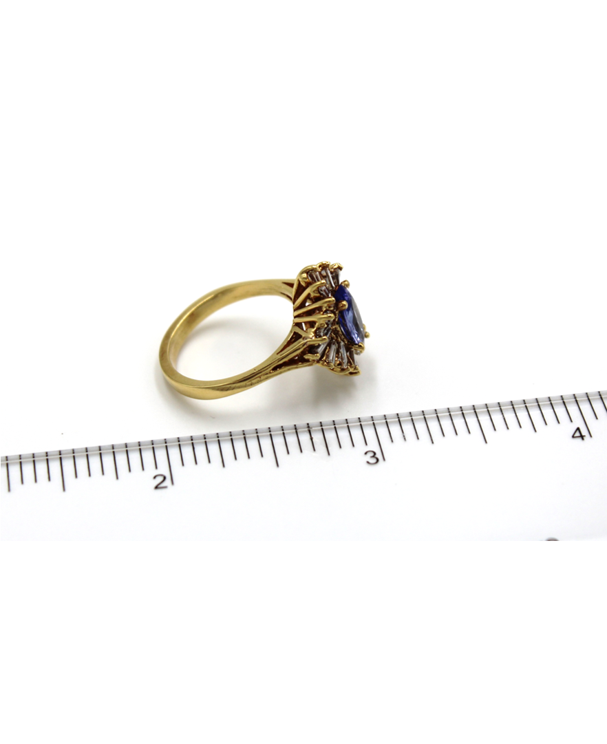 Vintage 1.04 Carat Marquise Tanzanite Ring with 1.34 Carat Baguette Diamonds Set in 18K Yellow Gold