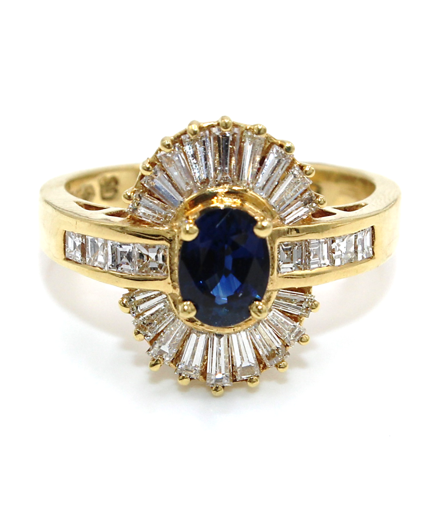 Vintage Oval Sapphire Ring with Baguette and Princess Cut Diamonds Set in 18K Gold