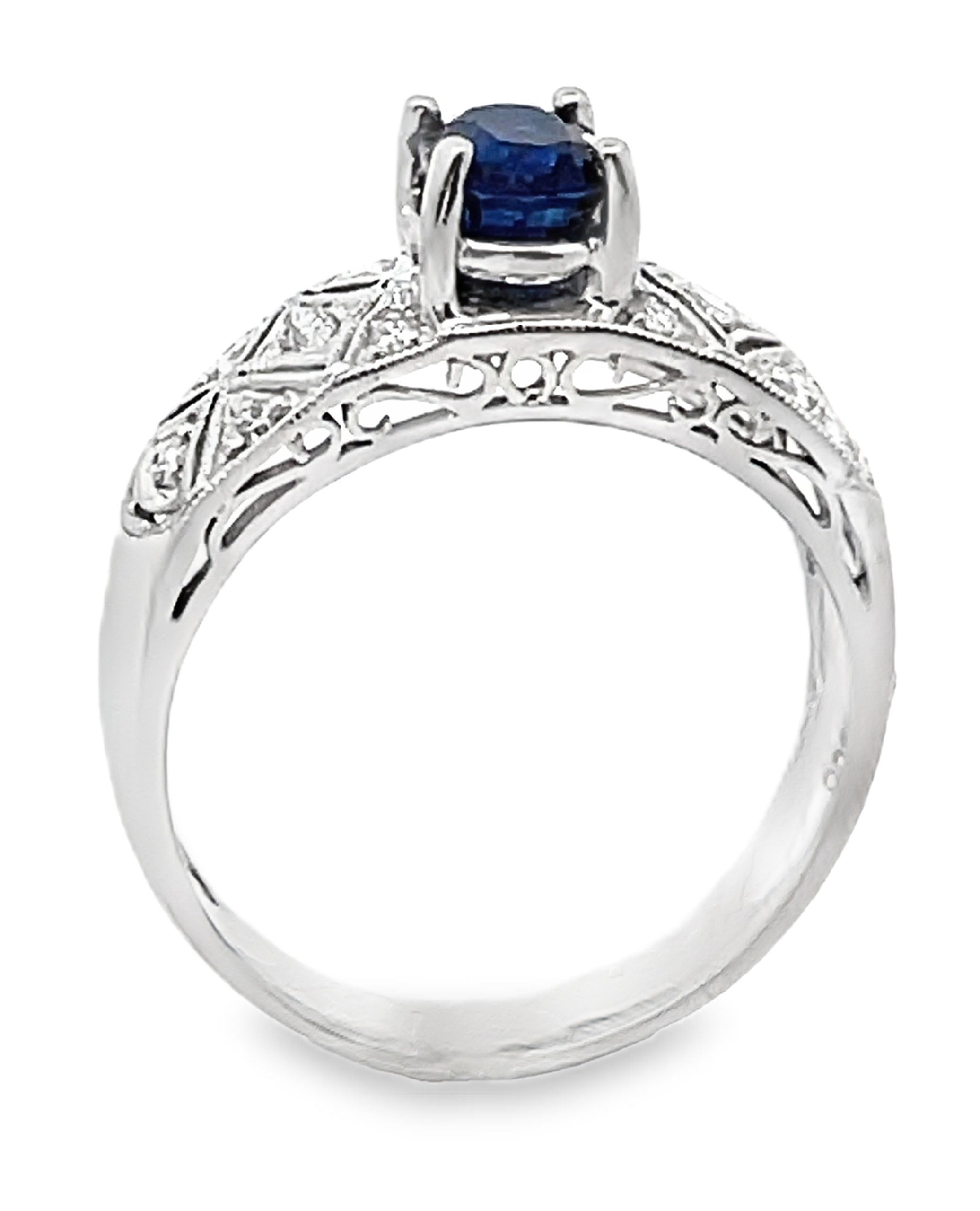Antique Inspired Platinum Ring with Oval Sapphire & Round Diamonds