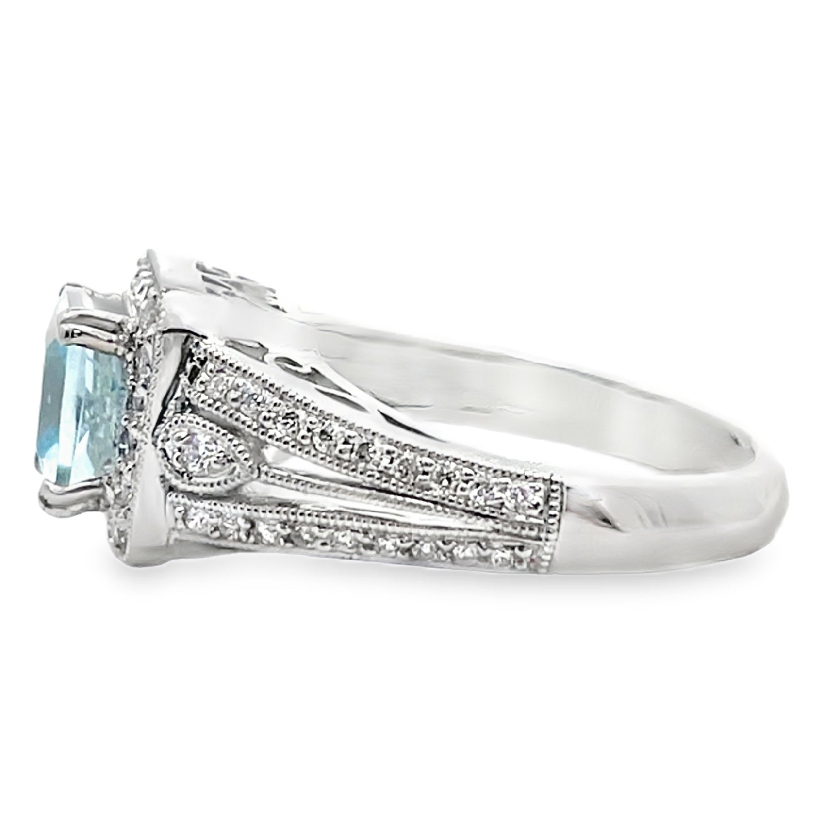 Platinum Vintage Inspired 1.30 Carat Blue Topaz Ring and 0.40 Carat Diamonds