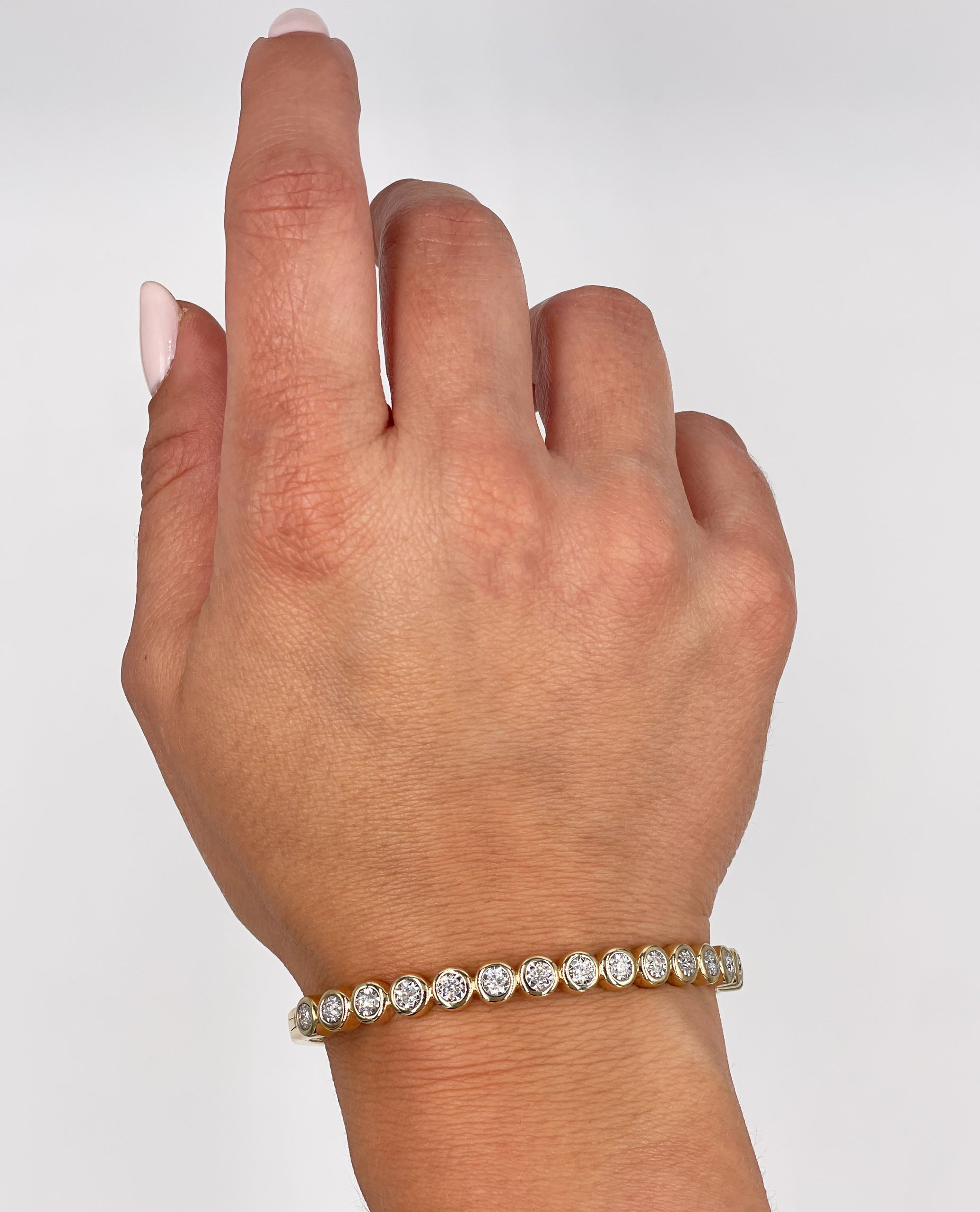 14K Yellow Gold Hinged Bangle Bracelet with Illusion Set Diamonds