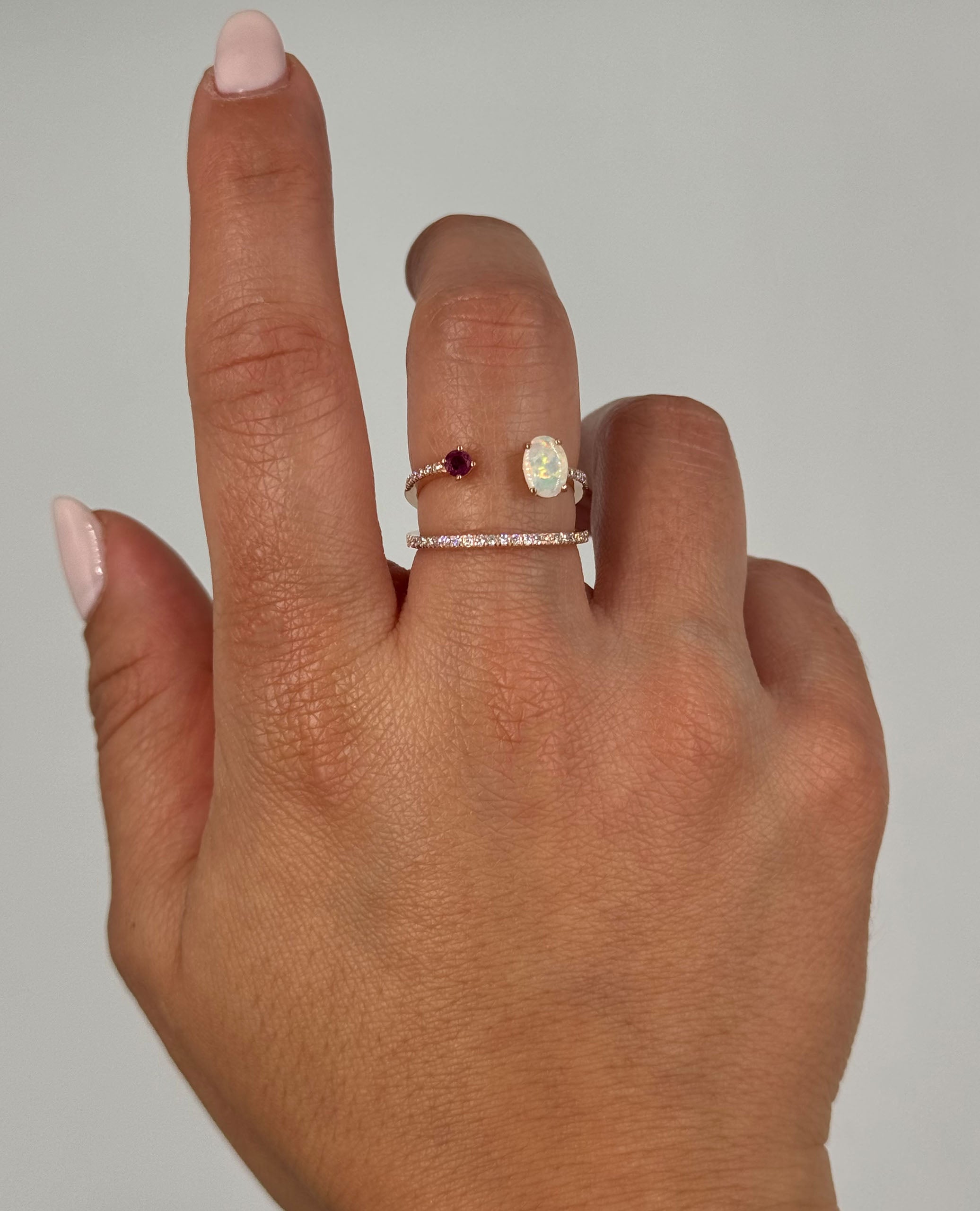 Oval Ruby and Opal Asymmetric Bypass Ring in 14K Rose Gold with Diamonds