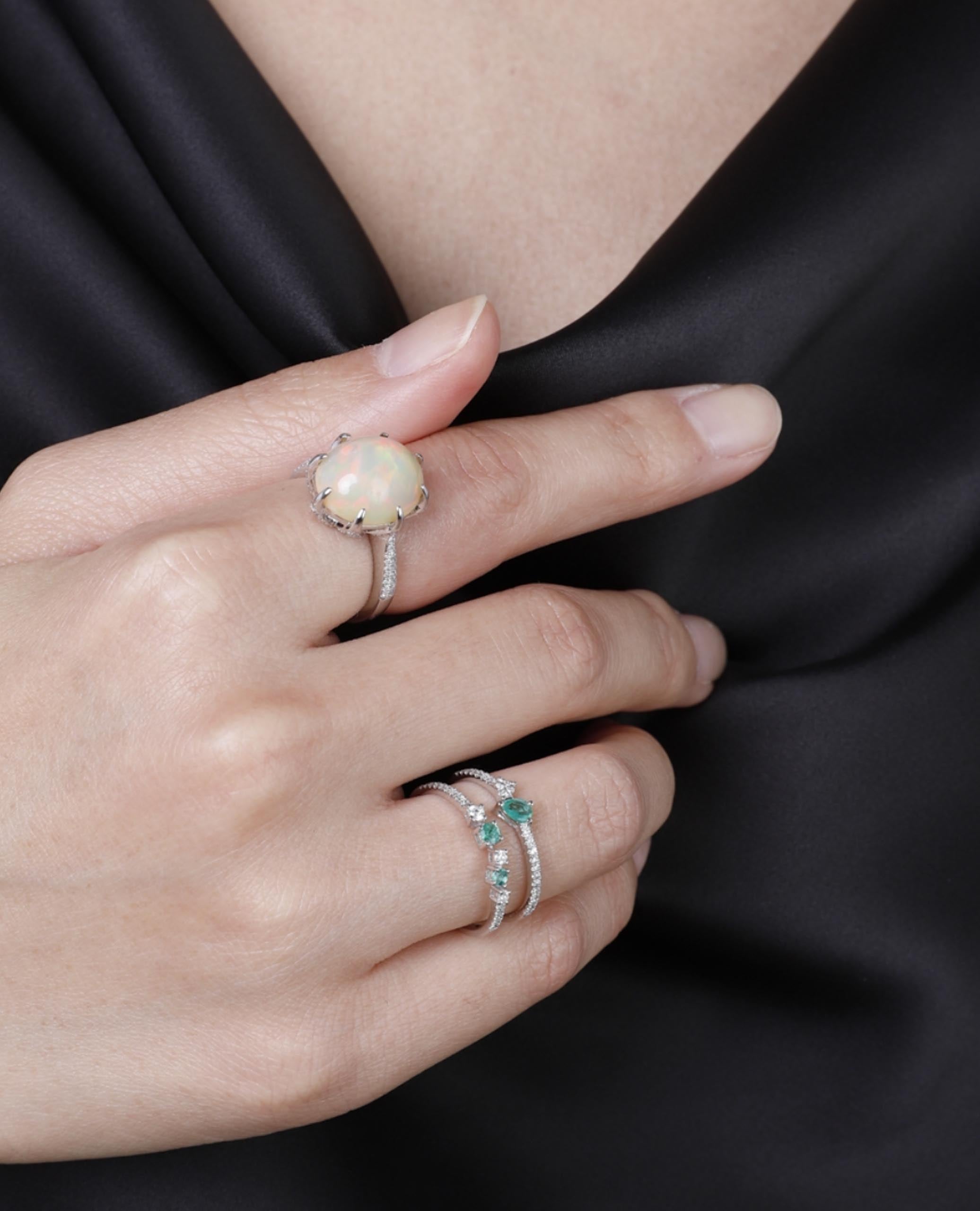 Oval Shaped Opal Ring Prong Set in 14K White Gold