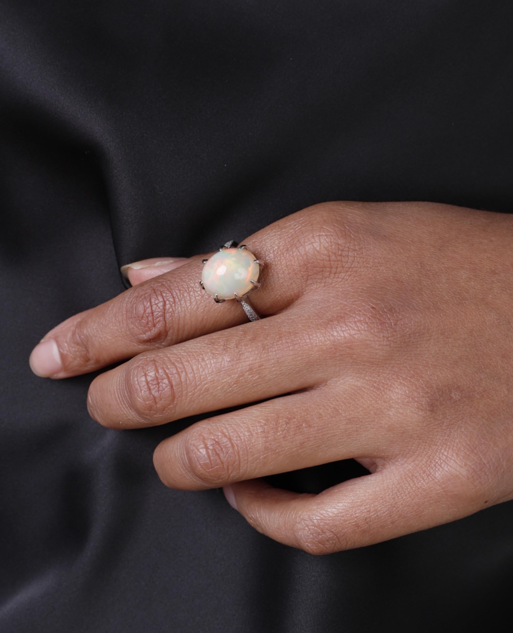 Oval Shaped Opal Ring Prong Set in 14K White Gold