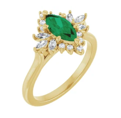 Payment 1 of 2: 14K Yellow Gold Marquise Engagement Ring with 0.33 carat Lab-Grown Diamonds. In the Center One 9x4.5 mm Marquise Shape Lab-Grown Emerald