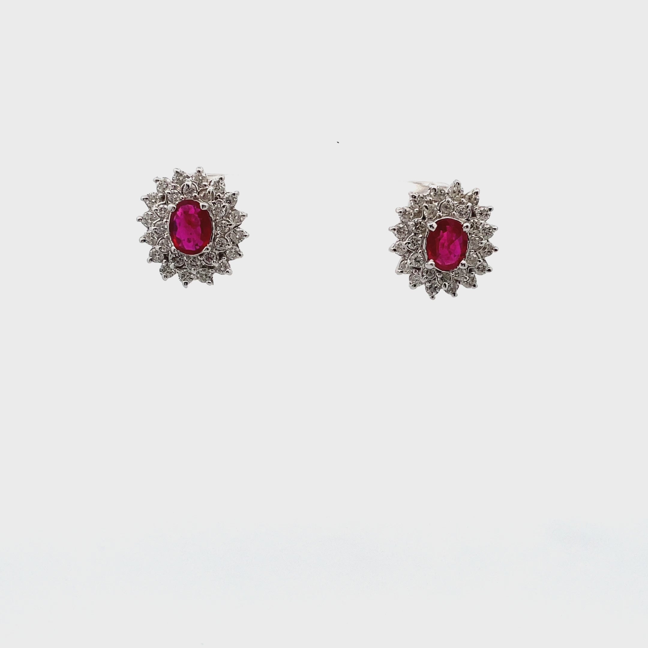 Oval Ruby Earrings with Starburst Diamonds in 18K White Gold with Omega Backs