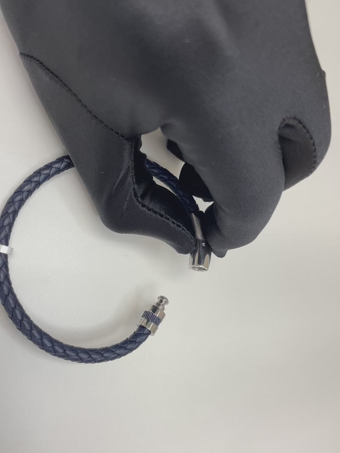 Blue Leather Braided Bracelet with Push Button Lock on Top to Release Clasp