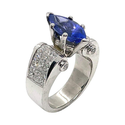 Marquie Tanzanite and Invisibly Set Diamonds in Platinum Ring