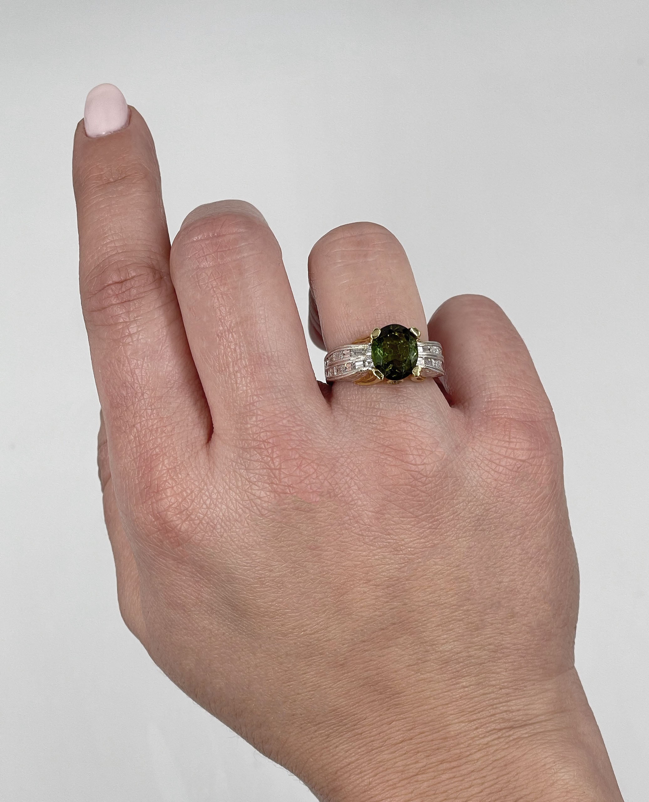 Oval Green Tourmaline Solitaire Ring in Two Tone Hand Engraved Diamond Setting