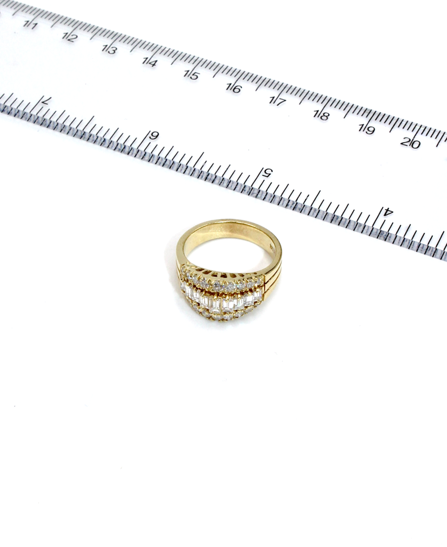 Vintage Tapered Diamond Band Ring with Baguette and Round Diamonds Totaling 1.30 Carats