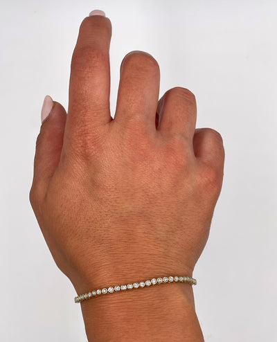 14K Yellow Gold Illusion Set Tennis Bracelet with Diamonds 0.32 Carats