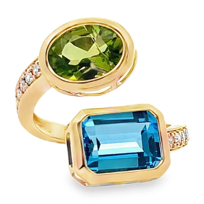 14K Yellow Gold Bypass Ring With Diamonds Totaling 0.23 Carats, One Blue Topaz 2.64 Carats, One Oval Peridot 1.73 Carats