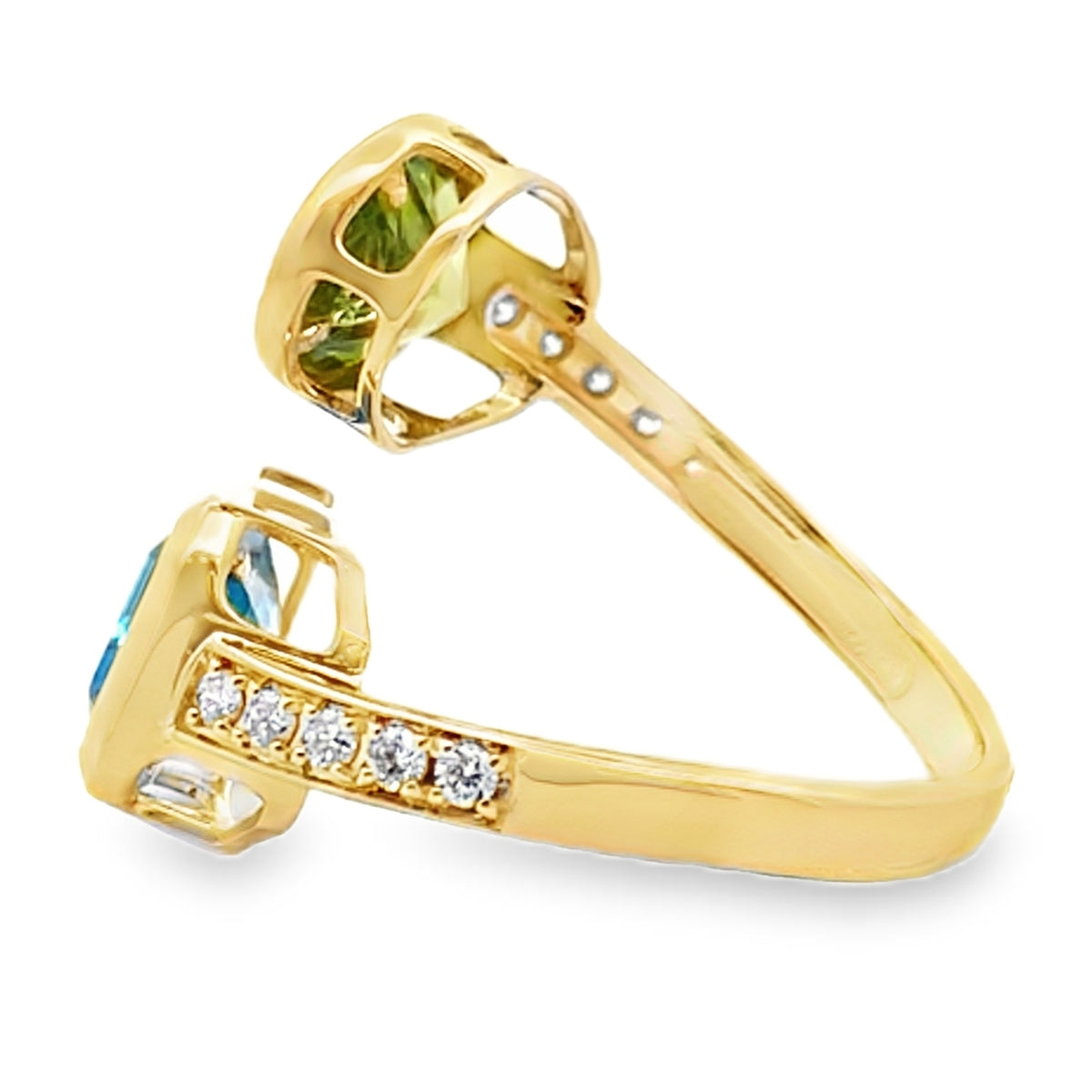 14K Yellow Gold Bypass Ring With Diamonds Totaling 0.23 Carats, One Blue Topaz 2.64 Carats, One Oval Peridot 1.73 Carats