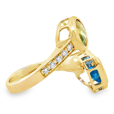 14K Yellow Gold Bypass Ring With Diamonds Totaling 0.23 Carats, One Blue Topaz 2.64 Carats, One Oval Peridot 1.73 Carats