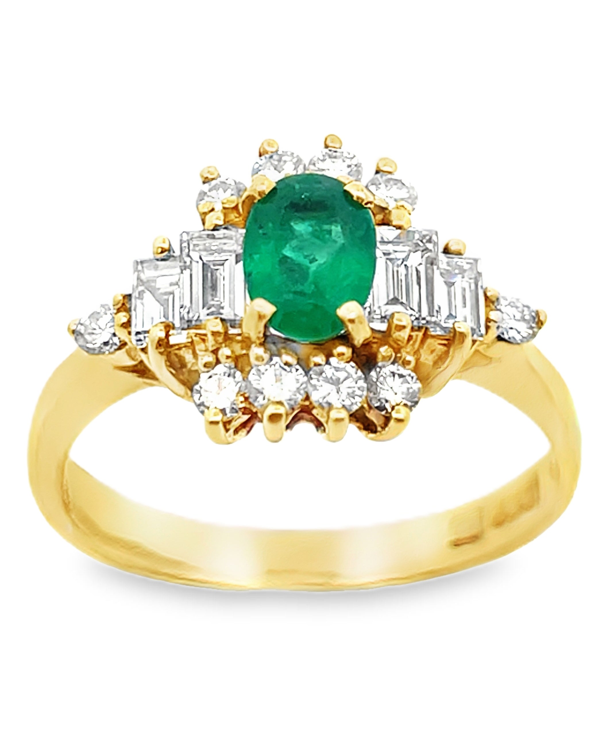 Vintage Oval Emerald Ring with Round and Baguette Diamonds Set in 18K Yellow Gold