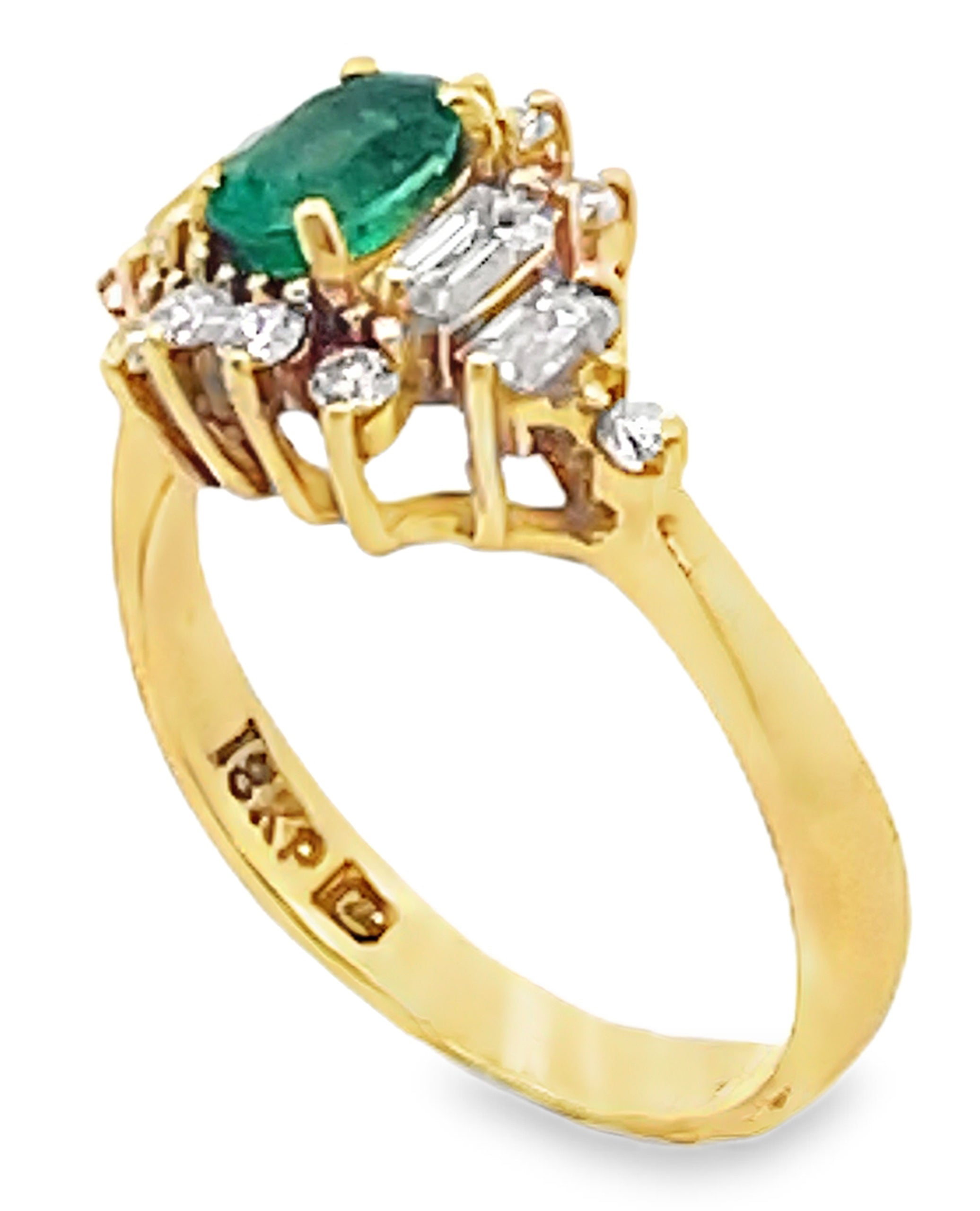 Vintage Oval Emerald Ring with Round and Baguette Diamonds Set in 18K Yellow Gold