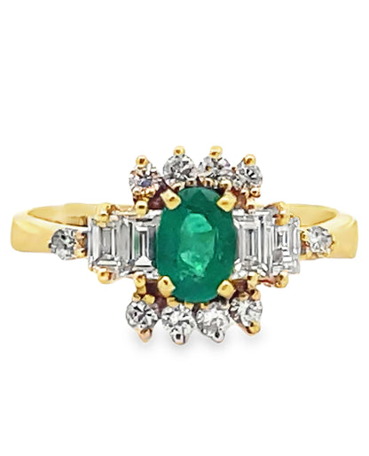 Vintage Oval Emerald Ring with Round and Baguette Diamonds Set in 18K Yellow Gold