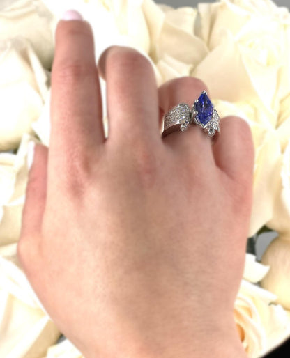 Marquie Tanzanite and Invisibly Set Diamonds in Platinum Ring