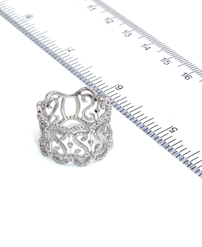 Wide 18K White Gold Ring with Repeating "S" Motif with Round Diamonds