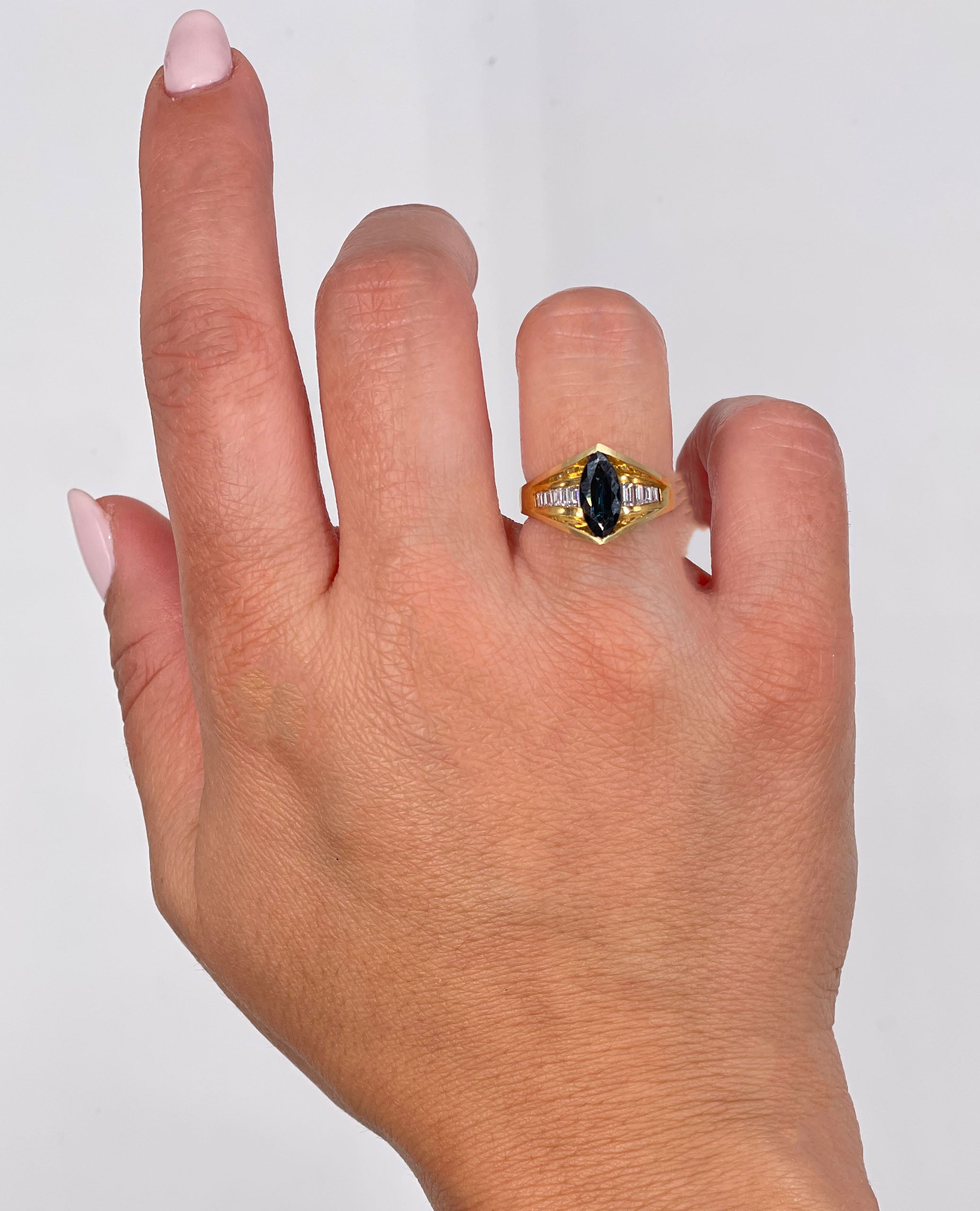 Marquise Sapphire Ring with Baguette Diamonds in 14K Yellow Gold