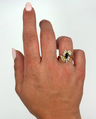 Vintage 0.80 Carat Marquise Sapphire Ring with Bageutte and Round Diamonds 1.10 Carats in 18K Yellow Gold