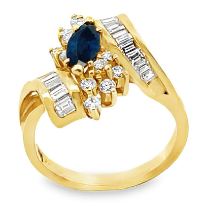 Vintage 0.80 Carat Marquise Sapphire Ring with Bageutte and Round Diamonds 1.10 Carats in 18K Yellow Gold