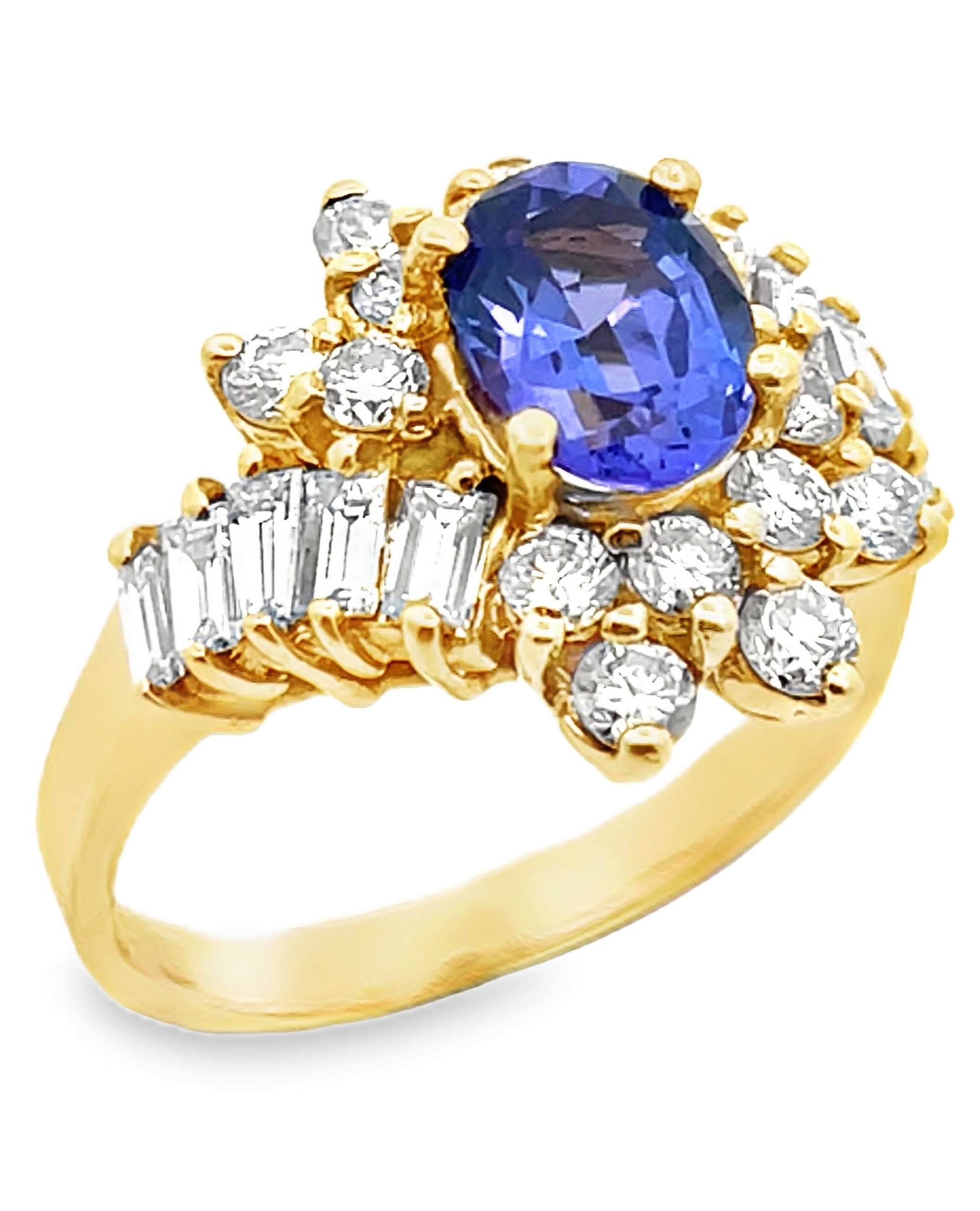 Vintage Oval Tanzanite Ring with Round and Baguette Diamonds Set in 14k Gold