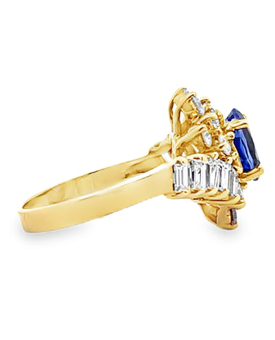 Vintage Oval Tanzanite Ring with Round and Baguette Diamonds Set in 14k Gold