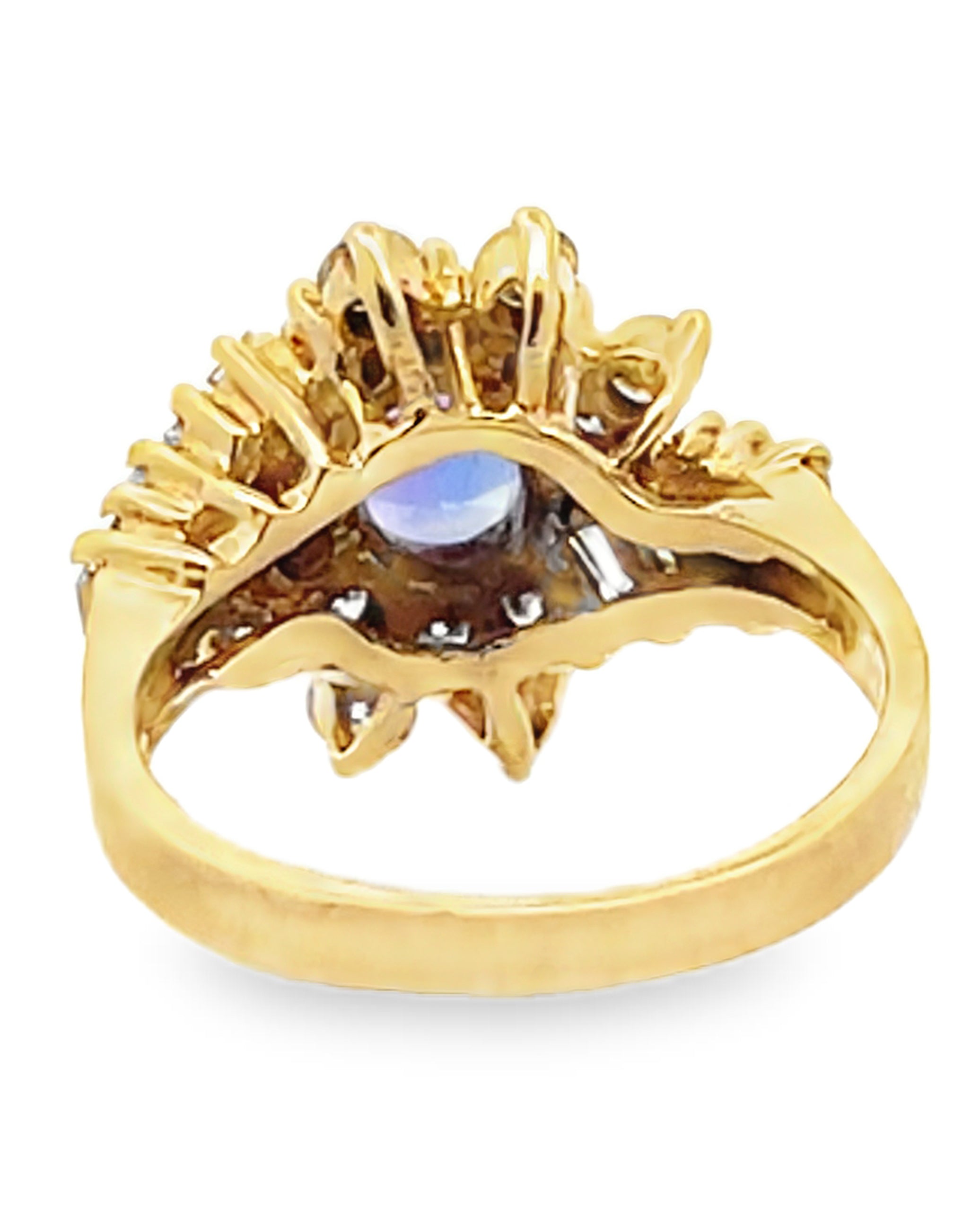 Vintage Oval Tanzanite Ring with Round and Baguette Diamonds Set in 14k Gold