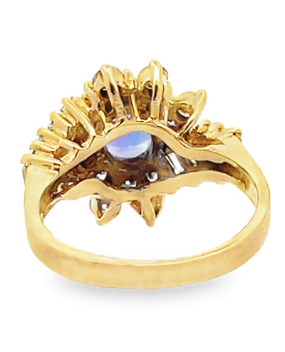 Vintage Oval Tanzanite Ring with Round and Baguette Diamonds Set in 14k Gold