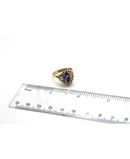 Vintage 1.04 Carat Marquise Tanzanite Ring with 1.34 Carat Baguette Diamonds Set in 18K Yellow Gold