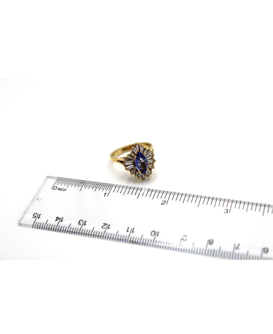 Vintage 1.04 Carat Marquise Tanzanite Ring with 1.34 Carat Baguette Diamonds Set in 18K Yellow Gold