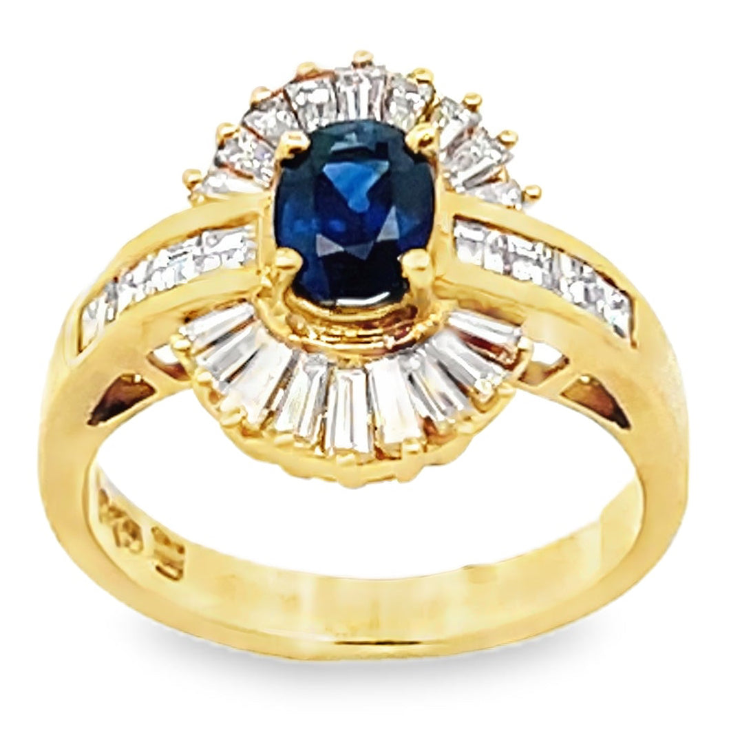 Vintage Oval 0.77 Carat Sapphire Ring with Baguette and Princess Cut Diamonds Set in 18K Gold