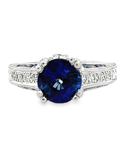 Round Sapphire in Platinum Ring with Diamonds and Hand Engraving