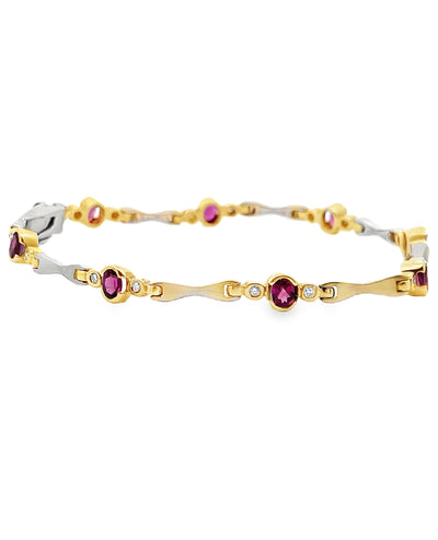 14K Two Tone Gold Bracelet with Round Diamonds and Oval Rhodolite