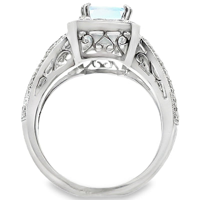 Platinum Vintage Inspired 1.30 Carat Blue Topaz Ring and 0.40 Carat Diamonds